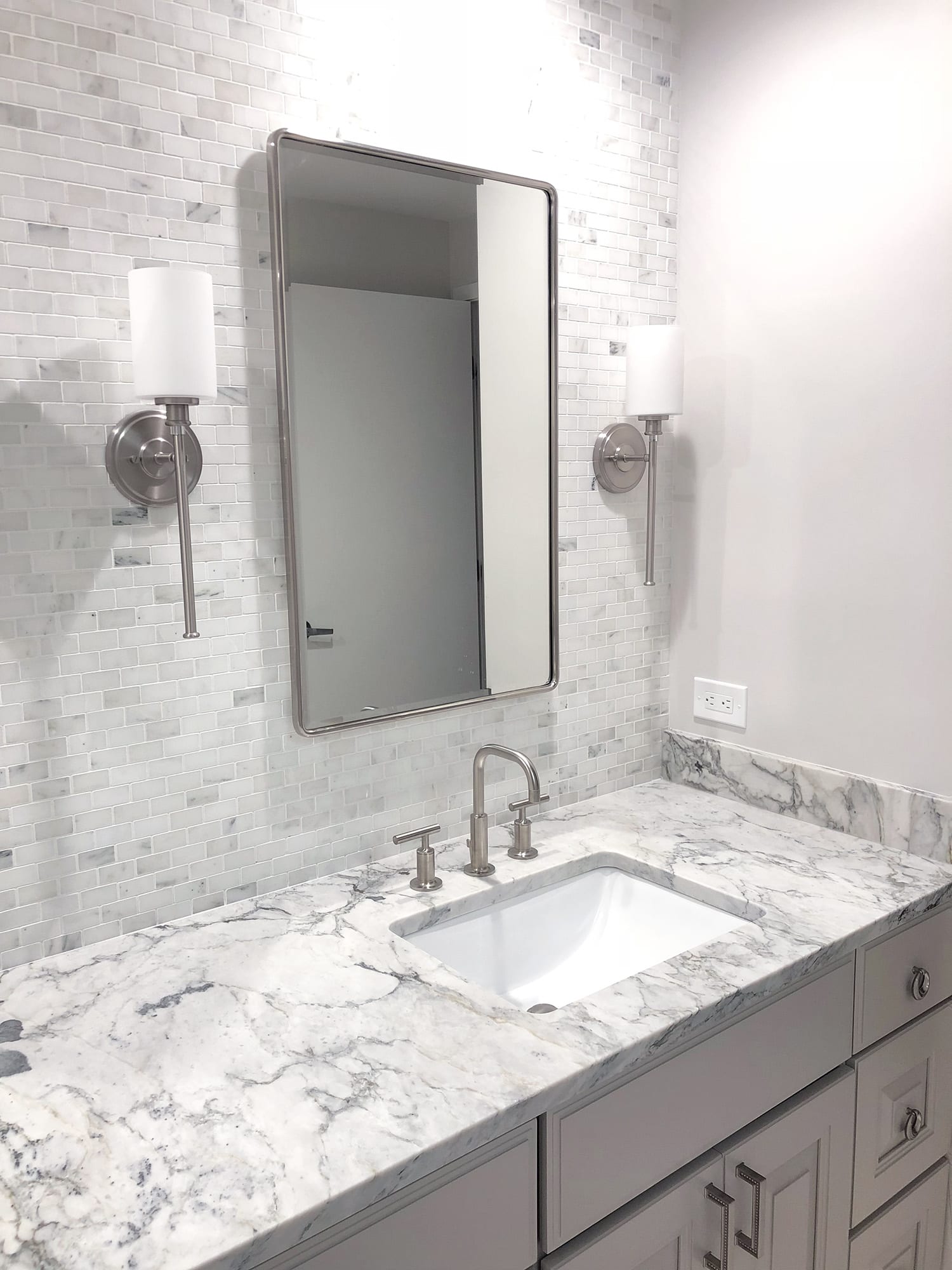 White Arabesque Counters & Olympian White Mosaic Tile — Stone City project
